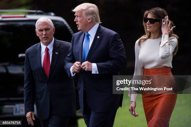 Vice President Mike Pence sees off President Donald Trump and first lady Melania Trump as they walk across the South Lawn to board Marine One and fly...