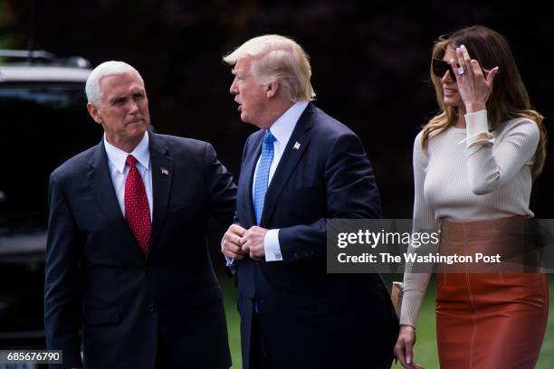 Vice President Mike Pence sees off President Donald Trump and first lady Melania Trump as they walk across the South Lawn to board Marine One and fly...