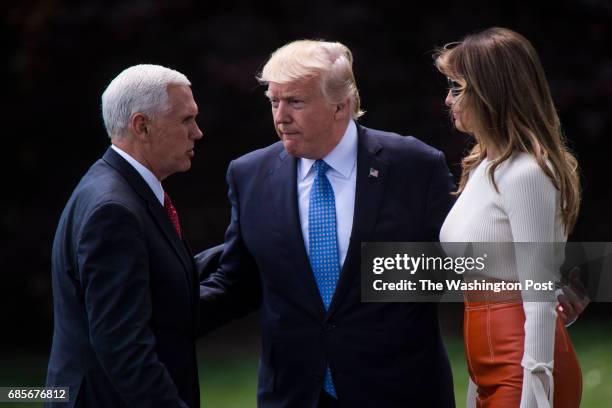 Vice President Mike Pence sees off President Donald Trump and first lady Melania Trump as they walk across the South Lawn to board Marine One and fly...