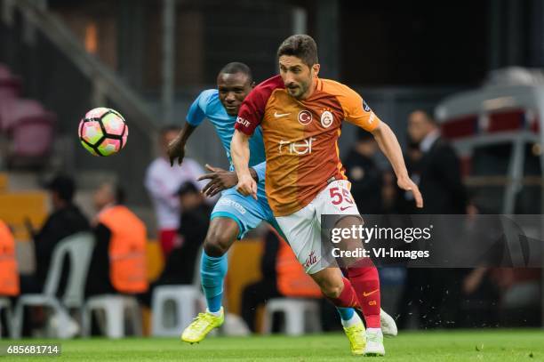 Aminu Umar of Osmanlispor Futbol Kulubu, Sabri Sarioglu of Galatasarayduring the Turkish Spor Toto Super Lig football match between Galatasaray SK...