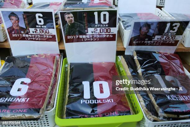 Scarves of Lucas Podolski, who is joining Vissel Kobe are on sale at a marchandise stall prior to the J.League J1 match between Vissel Kobe and FC...
