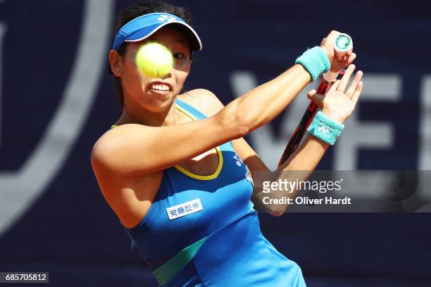 Mayo Hibi of Japan in action against Anastasiya Komardina of Russia in the qualification round during the WTA Nuernberger Versicherungscup on May 20,...