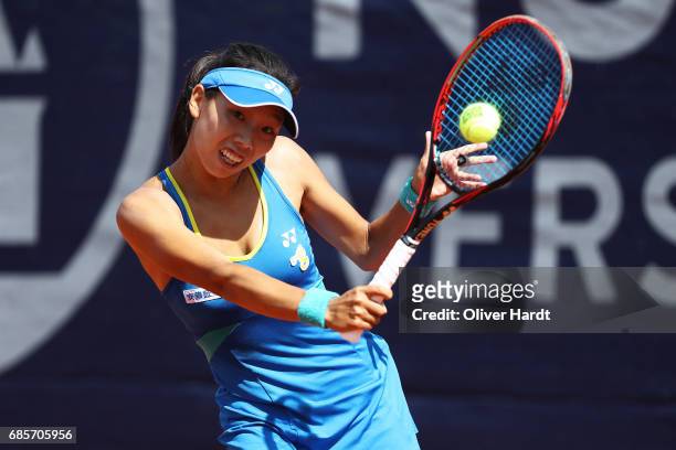 Mayo Hibi of Japan in action against Anastasiya Komardina of Russia in the qualification round during the WTA Nuernberger Versicherungscup on May 20,...