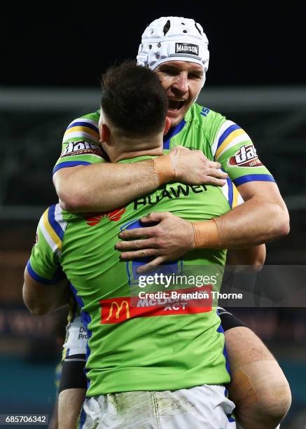 Nikola Cotric of the Raiders celebrates with team mate Jarrod Croker after scoring a try during the round 11 NRL match between the Parramatta Eels...