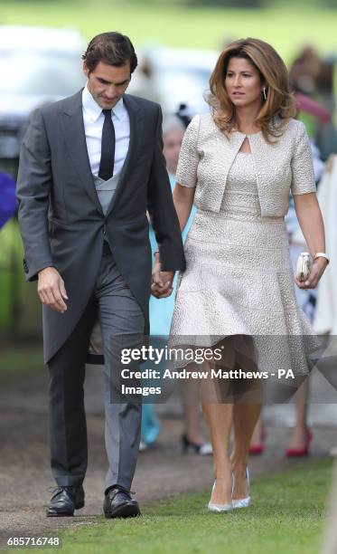 Roger Federer and his wife Mirka arrive ahead of the wedding of the Duchess of Cambridge's sister Pippa Middleton to her millionaire groom James...