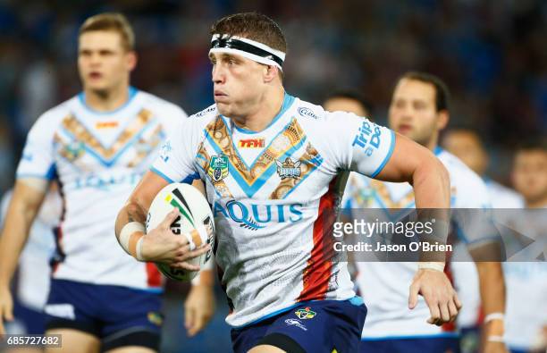Jarrod Wallace of the Titans runs with the ball during the round 11 NRL match between the Gold Coast Titans and the Manly Sea Eagles at Cbus Super...
