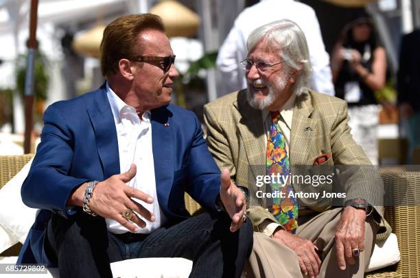 Arnold Schwarzenegger and Jean-Michel Cousteau attend photocall for 'Wonders of the Sea 3D' during the 70th annual Cannes Film Festival at Nikki...