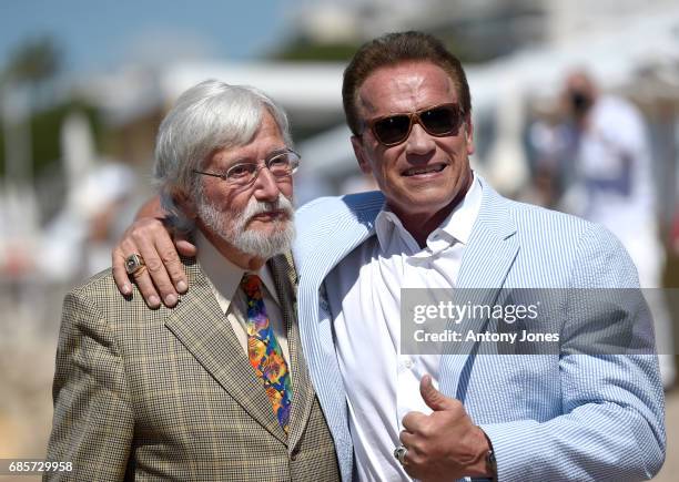 Jean-Michel Cousteau and Arnold Schwarzenegger attend photocall for 'Wonders of the Sea 3D' during the 70th annual Cannes Film Festival at Nikki...