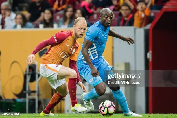 Semih Kaya of Galatasaray, Pierre Webo of Osmanlispor Futbol Kulubuduring the Turkish Spor Toto Super Lig football match between Galatasaray SK and...