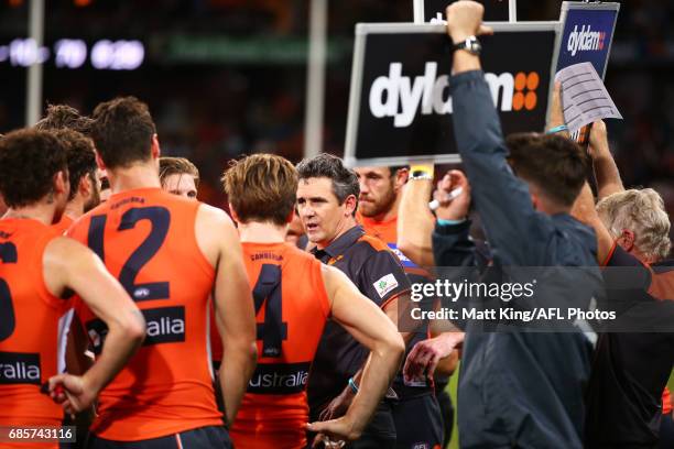 Giants head coach Leon Cameron speaks to players at three quarter time during the round nine AFL match between the Greater Western Sydney Giants and...