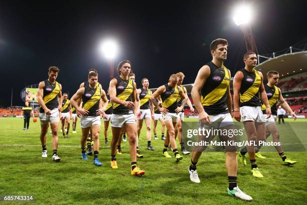 Trent Cotchin of the Tigers and team mates looks dejected after the round nine AFL match between the Greater Western Sydney Giants and the Richmond...