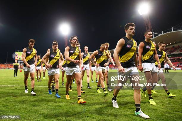 Trent Cotchin of the Tigers and team mates looks dejected after the round nine AFL match between the Greater Western Sydney Giants and the Richmond...