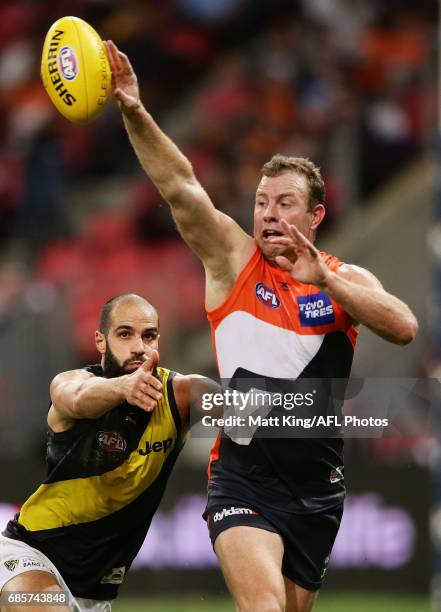 Steve Johnson of the Giants tips the ball off during the round nine AFL match between the Greater Western Sydney Giants and the Richmond Tigers at...