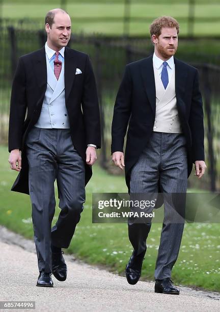 Britain's Prince Harry and Britain's Prince William, Duke of Cambridge attend the wedding of Pippa Middleton and James Matthews at St Mark's Church...