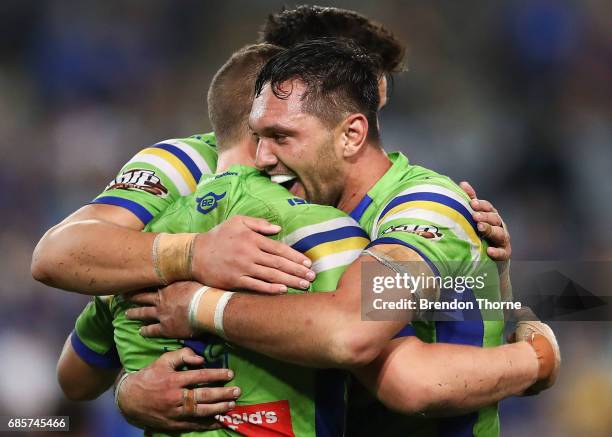 Jack Wighton of the Raiders celerates with team mate Jordan Rapana after a try saving tackle against the Eels at full time during the round 11 NRL...