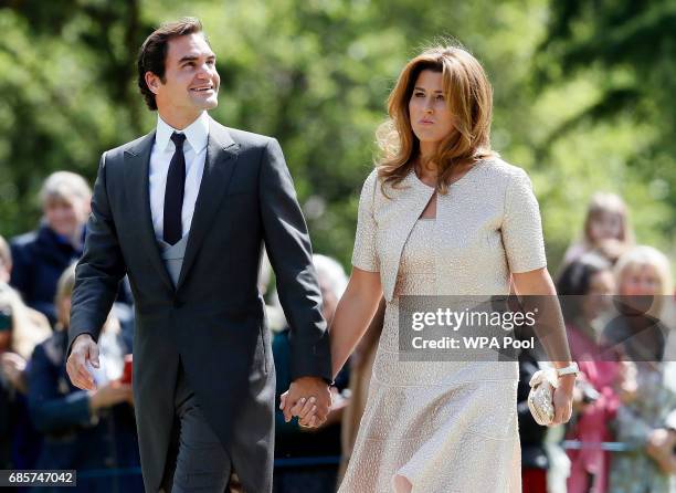 Swiss tennis player Roger Federer and his wife Mirka arrive at St Mark's Church ahead of the wedding of Pippa Middleton and James Matthews on May 20,...