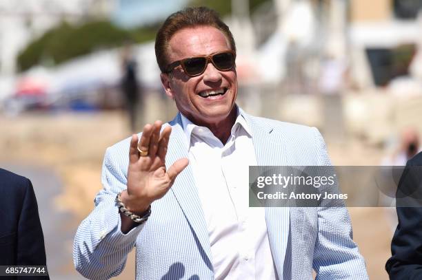 Arnold Schwarzenegger attends Arnold Schwarzenegger and Jean-Michel Cousteau Photocall for 'Wonders of the Sea 3D' during the 70th annual Cannes Film...