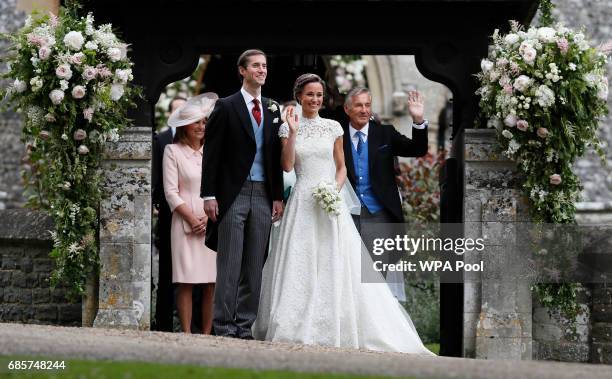 Pippa Middleton and James Matthews smile after their wedding at St Mark's Church on May 20, 2017 in Englefield, England. Middleton, the sister of...