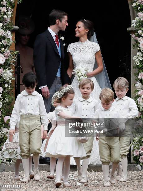 Pippa Middleton and James Matthews smile after their wedding at St Mark's Churchon May 20, 2017 in Englefield, England. Middleton, the sister of...