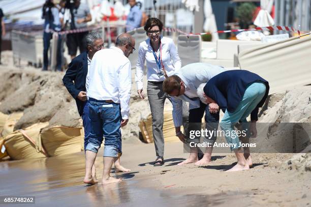 Jean-Michel Cousteau, guests attend Arnold Schwarzenegger and Jean-Michel Cousteau Photocall for 'Wonders of the Sea 3D' during the 70th annual...