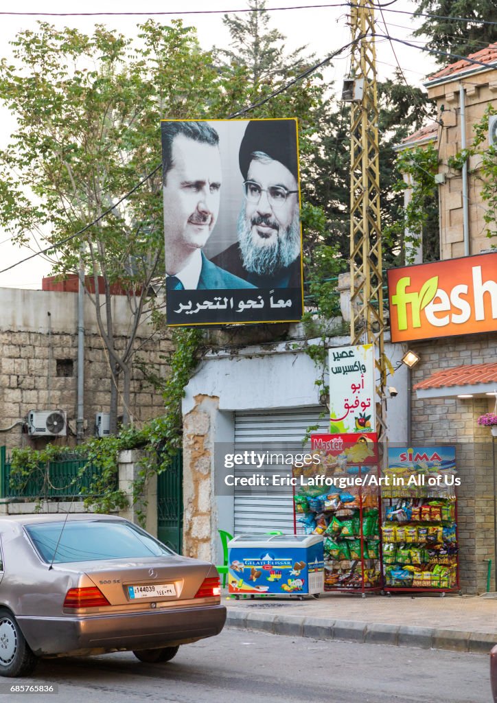 Bashar Al-Assad and Hassan Nasrallah portraits in the street, Beqaa Governorate, Baalbek, Lebanon...