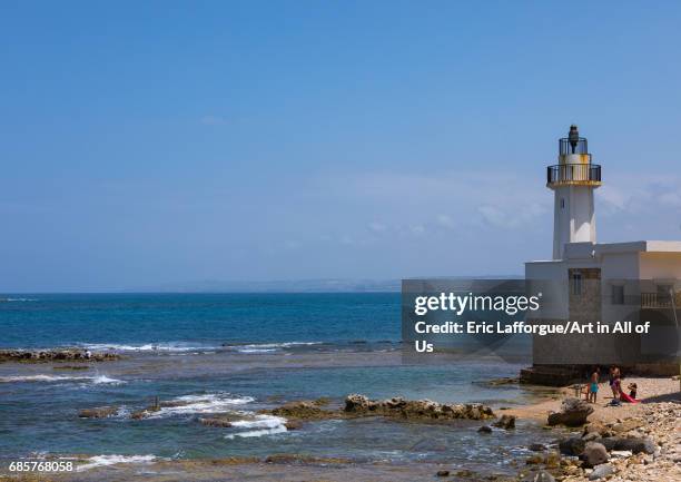 Lighthouse on a beach, South Governorate, Tyre, Lebanon on May 3, 2017 in Tyre, Lebanon.