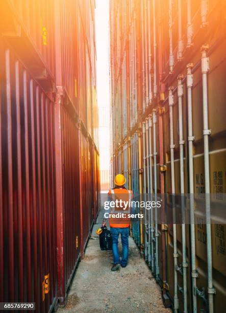 the engineer working with cargo containers - safe harbor stock pictures, royalty-free photos & images