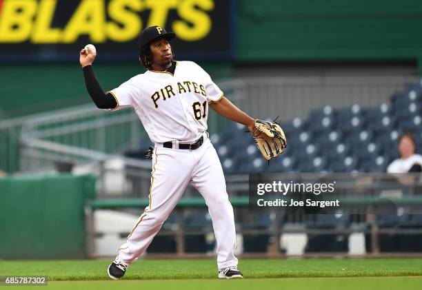 Gift Ngoepe of the Pittsburgh Pirates in action during the game against the Washington Nationals at PNC Park on May 17, 2017 in Pittsburgh,...