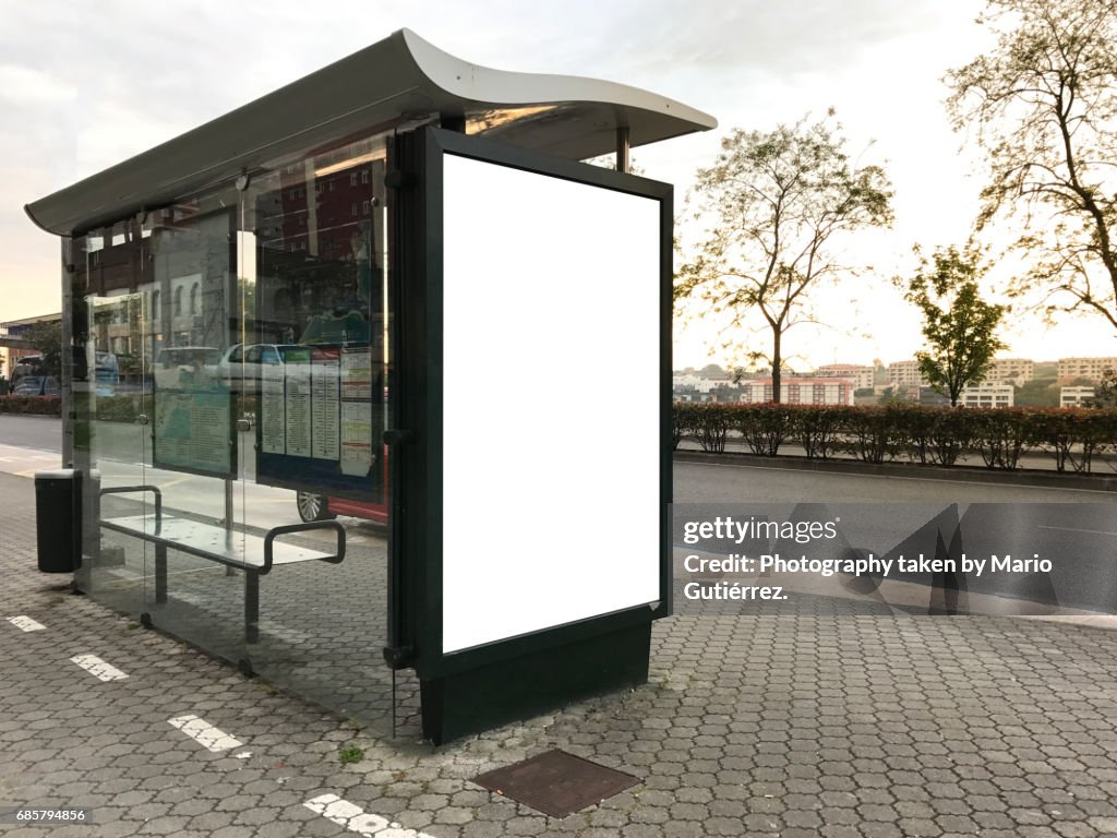 Modern bus stop with billboard