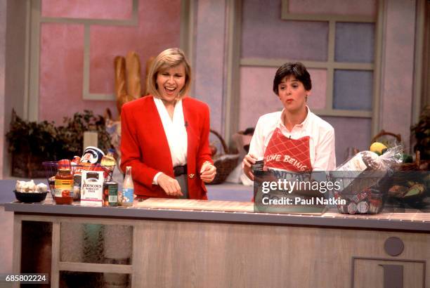 Television host Jenny Jones during a home cooking segment on her talk show, Chicago, Illinois, September 11, 1991.
