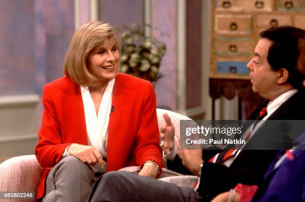 Television host Jenny Jones interviews an unidentified guest duing her talk show, Chicago, Illinois, September 11, 1991.