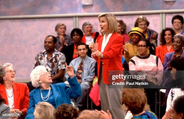 Television host Jenny Jones speaks with members of the audience during her talk show, Chicago, Illinois, September 11, 1991.