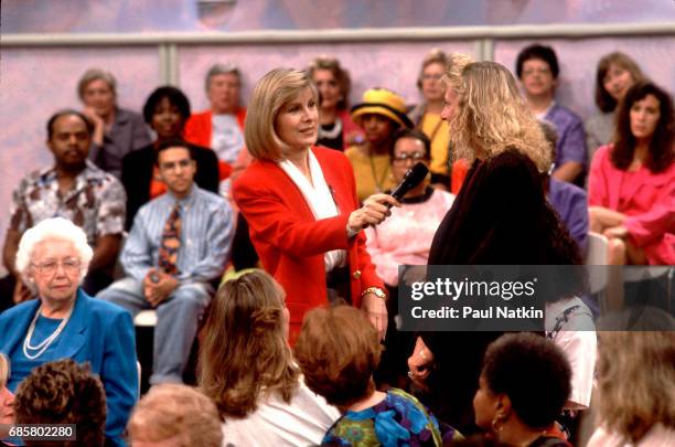 Television host Jenny Jones speaks with members of the audience during her talk show, Chicago, Illinois, September 11, 1991.