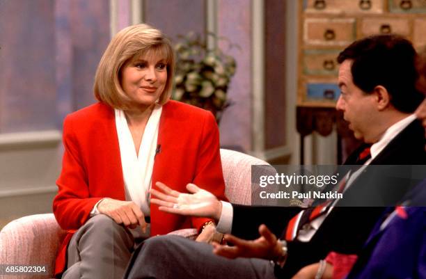 Television host Jenny Jones interviews an unidentified guest duing her talk show, Chicago, Illinois, September 11, 1991.