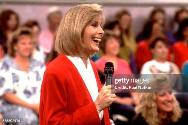 Television host Jenny Jones speaks with members of the audience during her talk show, Chicago, Illinois, September 11, 1991.