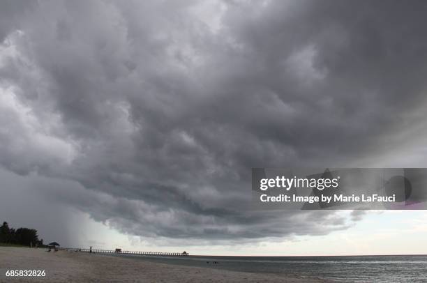 extreme stormy weather at the beach - a picture of a barometer foto e immagini stock