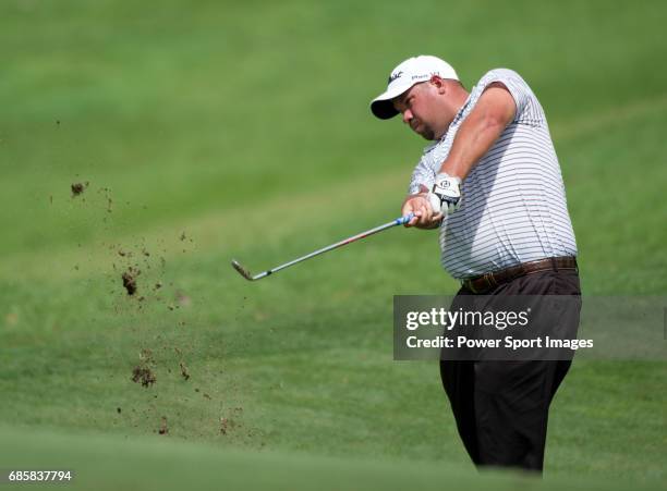 Brendon De Jonge takes his second shot on the eighth fairway during Round 2 of the CIMB Asia Pacific Classic 2011 at the MINES resort and golf club,...