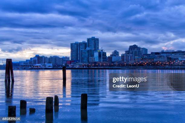 new westminster cityscape after sunset, bc, canada - new westminster stock pictures, royalty-free photos & images