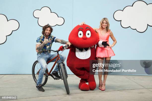 The showgirl Maddalena Corvaglia and the biker Vittorio Brumotti presenting the Tv show Paperissima Sprint summer edition with the puppet Gabibbo....