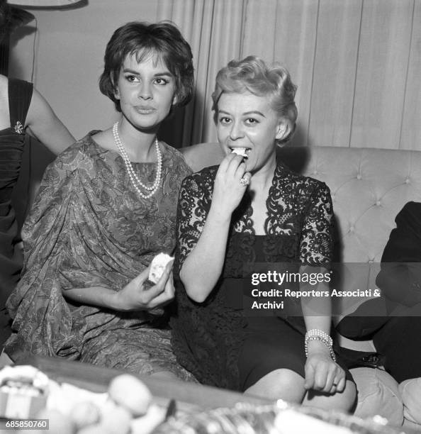 Italian actresses Giulietta Masina and Antonella Lualdi celebrating New Year's Eve in Fellini's house. 31th December 1958