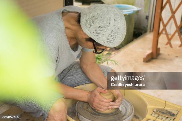 artisan-skinned potter - 陶芸家 stock pictures, royalty-free photos & images