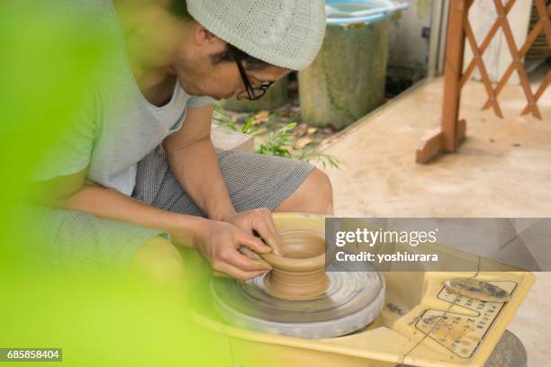 artisan-skinned potter - 陶芸家 stock pictures, royalty-free photos & images