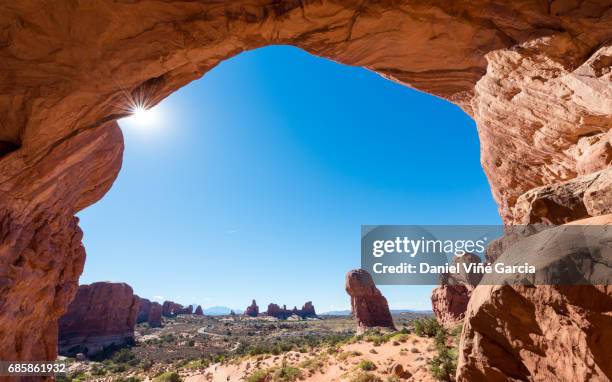 double arch at arches national park - navajo sandstone formations stock pictures, royalty-free photos & images