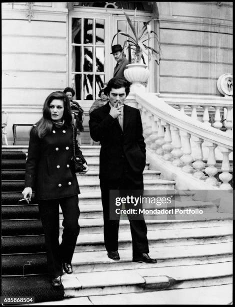 The Italian-French singer Dalida and Italian singer Luigi Tenco descend the steps of the Casino in the afternoon of the day before the singer's...