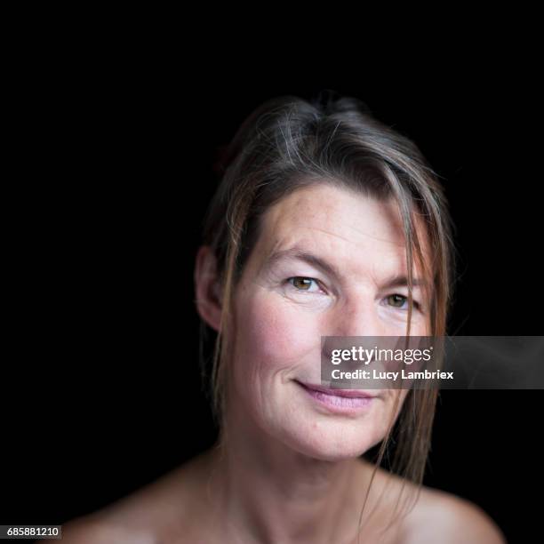portrait of a fifty-year-old woman - rosy cheeks stock pictures, royalty-free photos & images