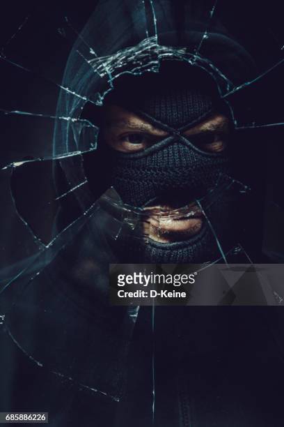 burglar - bank robber stock pictures, royalty-free photos & images