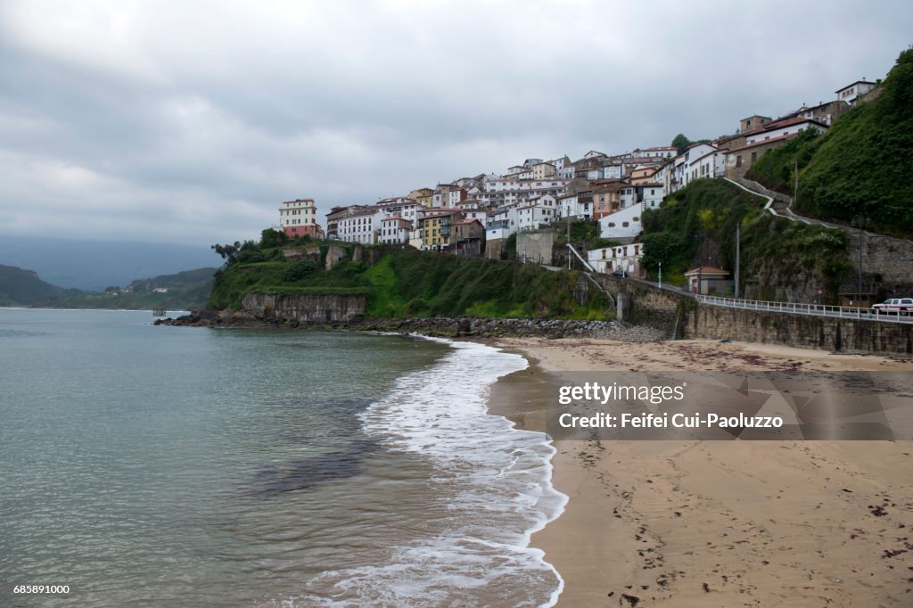 Beach and city of Lastres, in Asturias, northern Spain