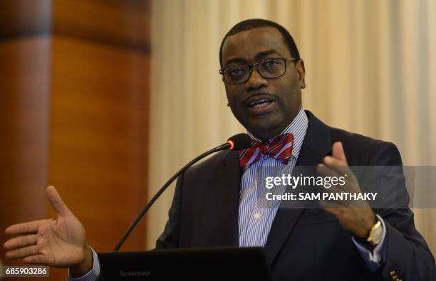 African Development Bank President Akinwumi Adesina gestures as he addresses a press conference in Ahmedabad on May 20 ahead of the ADB Annual...