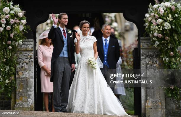 Pippa Middleton and her new husband James Matthews leave St Mark's Church in Englefield, west of London, on May 20, 2017 following their wedding...
