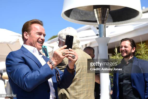 Arnold Schwarzenegger attends photocall for 'Wonders of the Sea 3D' during the 70th annual Cannes Film Festival at Nikki Beach on May 20, 2017 in...